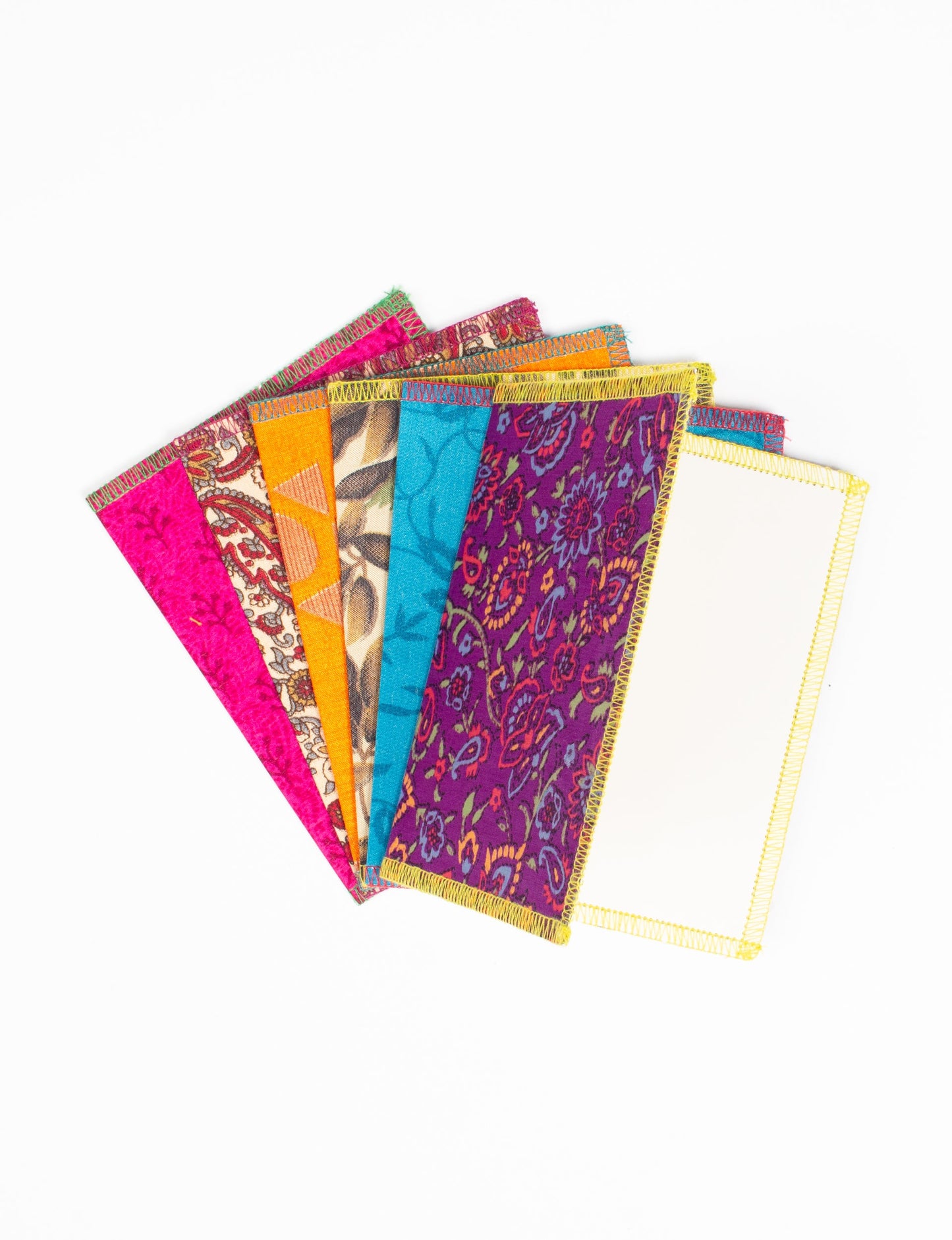 Folded Celebration Card Set, 6 pieces made from recycled sari fabric, showcasing sustainable, eco-friendly, and upcycled fashion principles. Ideal for sending wishes while supporting circular fashion, sustainable apparel, and environmentally friendly practices.