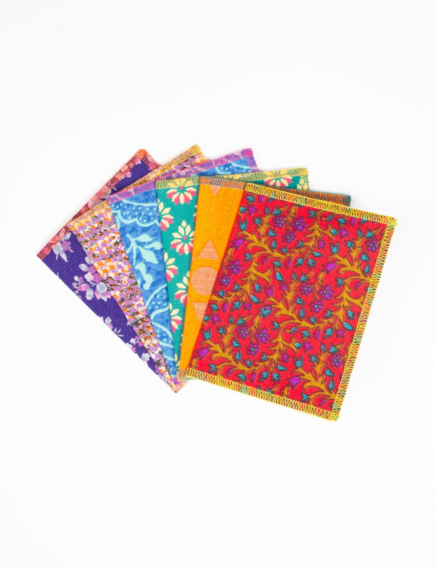 Folded Celebration Card Set, 6 pieces made from recycled sari fabric, showcasing sustainable, eco-friendly, and upcycled fashion principles. Ideal for sending wishes while supporting circular fashion, sustainable apparel, and environmentally friendly practices.