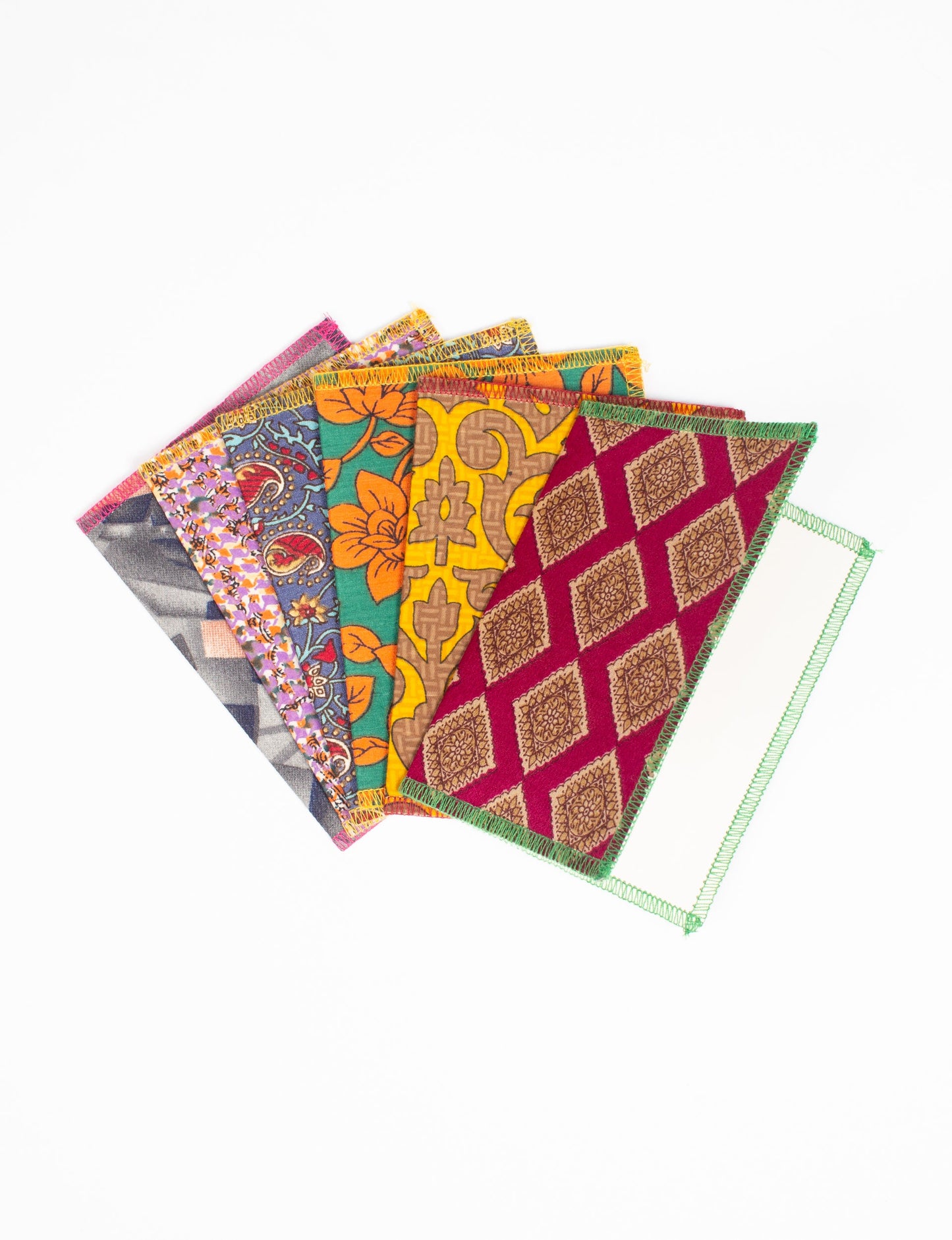 Folded Celebration Card Set, 6 pieces made from recycled sari fabric, showcasing sustainable, eco-friendly, and upcycled fashion principles. Ideal for sending wishes while supporting circular fashion, sustainable apparel, and environmentally friendly practices.