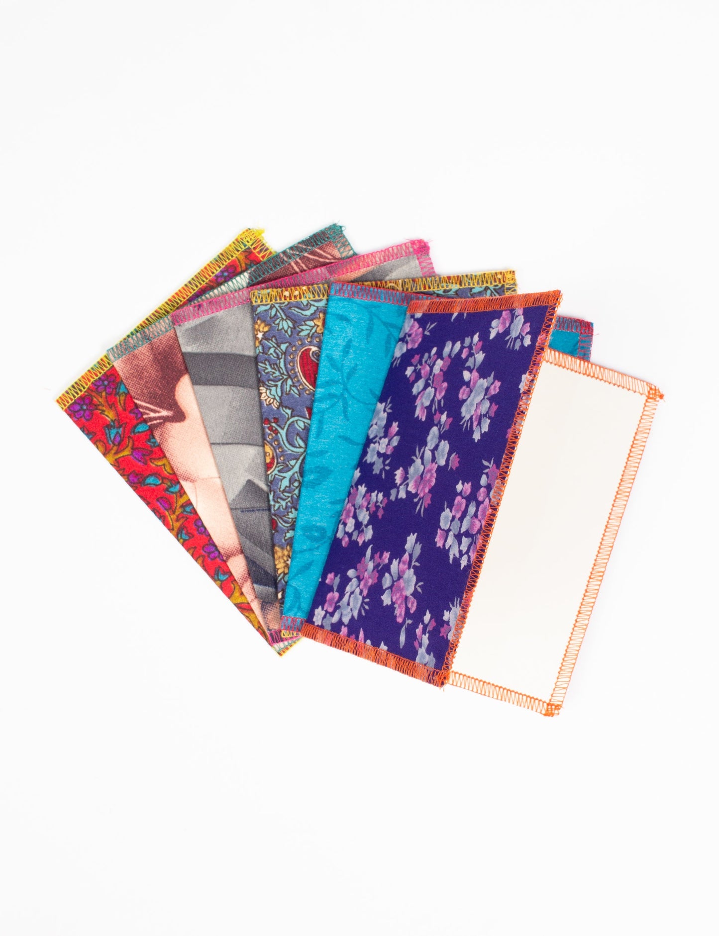 Folded Celebration Card Set, 6 pieces made from recycled sari fabric, showcasing sustainable, eco-friendly, and upcycled fashion principles. Ideal for sending wishes while supporting circular fashion, sustainable apparel, and environmentally friendly practices.