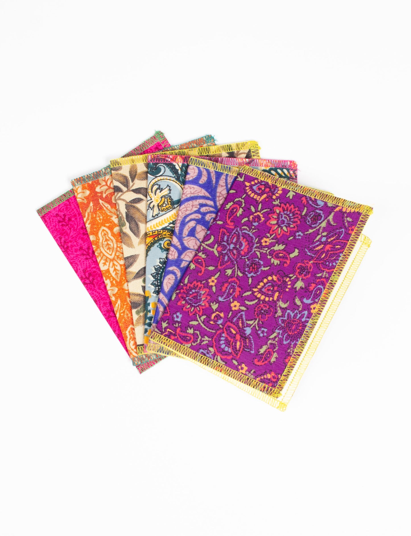 Folded Celebration Card Set, 6 pieces made from recycled sari fabric, showcasing sustainable, eco-friendly, and upcycled fashion principles. Ideal for sending wishes while supporting circular fashion, sustainable apparel, and environmentally friendly practices.