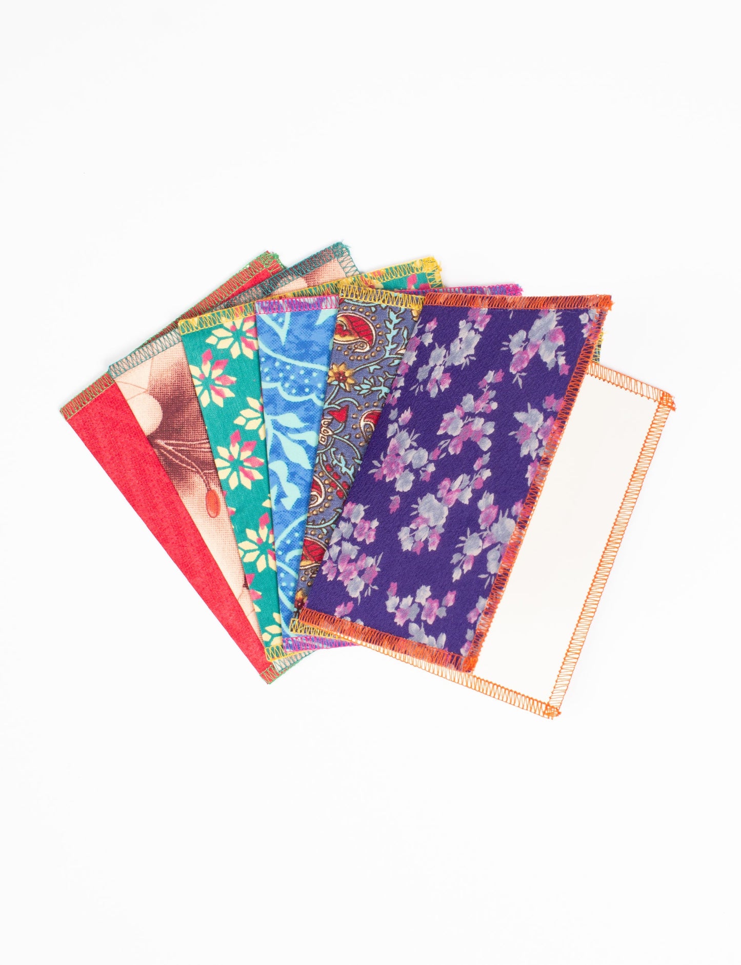 Folded Celebration Card Set, 6 pieces made from recycled sari fabric, showcasing sustainable, eco-friendly, and upcycled fashion principles. Ideal for sending wishes while supporting circular fashion, sustainable apparel, and environmentally friendly practices.