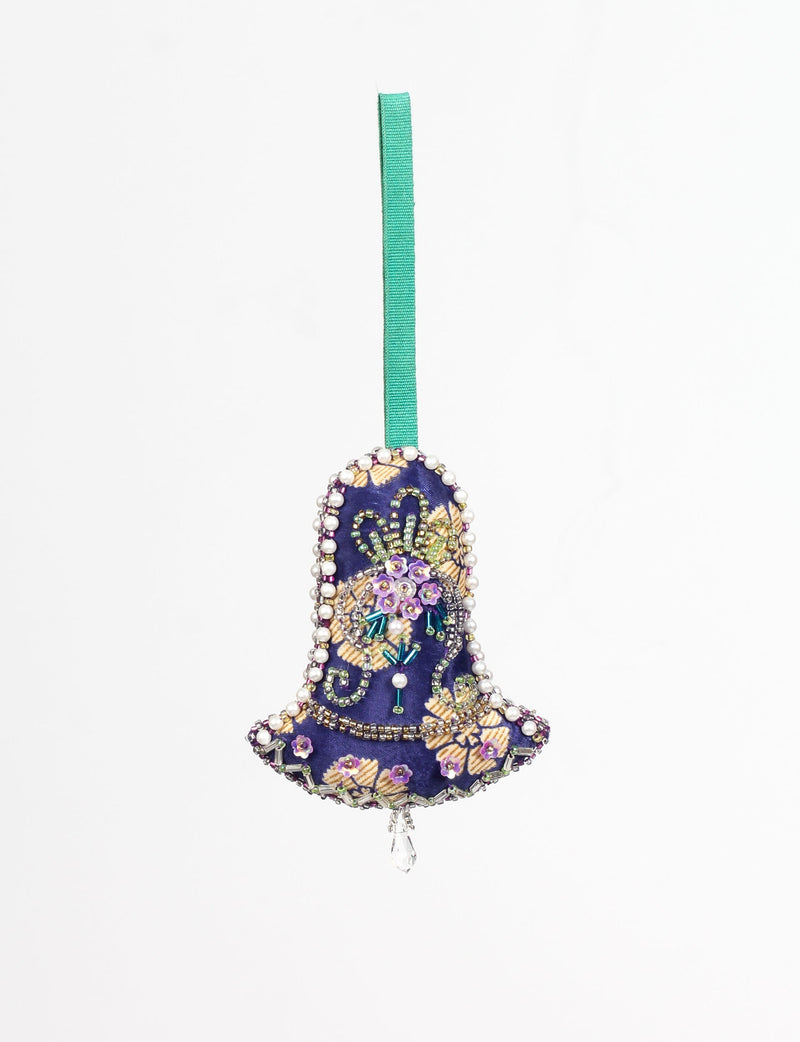Blue fabric bell ornament with gold floral print, purple and green bead embroidery, pearl trim, and green hanging loop