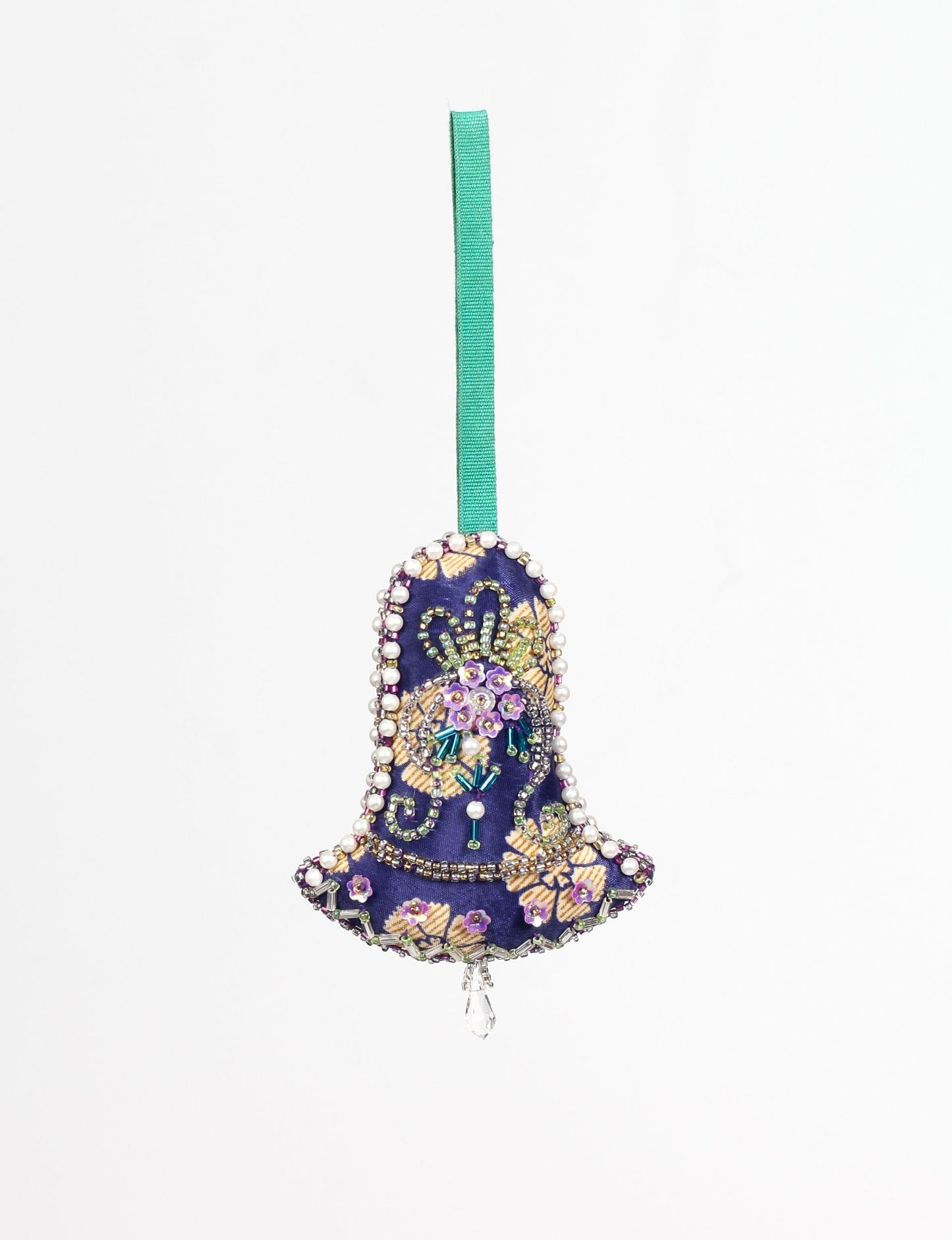 Bell-shaped Christmas ornament made from recycled saris, showcasing Aari embroidery, sustainable apparel, and green fashion. A celebration of upcycled clothing and eco-friendly products with a focus on sustainable women’s clothing and recycled fashion.