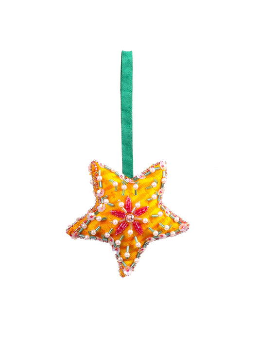 Christmas Star Ornaments made from upcycled saris with hand-embroidered Aari work, showcasing sustainable fashion and eco-friendly craftsmanship for ethical and green holiday decor.