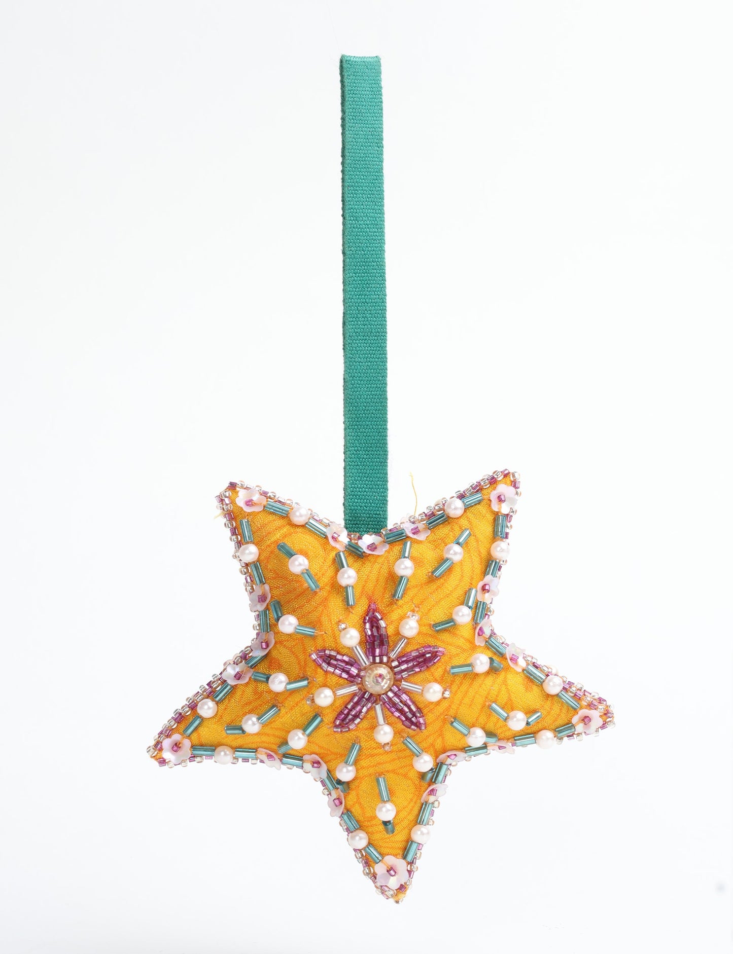 Christmas Star Ornaments made from upcycled saris with hand-embroidered Aari work, showcasing sustainable fashion and eco-friendly craftsmanship for ethical and green holiday decor.