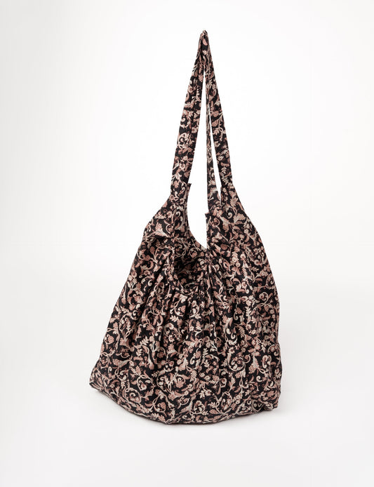 A stylish HOBO BAG made from recycled materials, perfect for eco-conscious fashionistas.