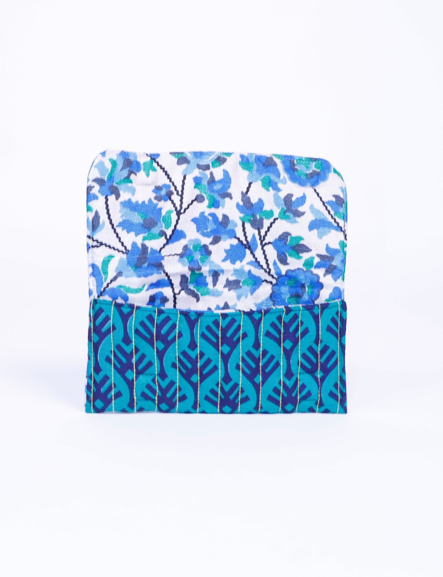 Quilted sunglasses case made from recycled sari products, featuring a secure magnetic closure. A chic example of ethical fashion, conscious clothing, and carbon neutral fashion. Protect your sunglasses while embracing circular fashion and upcycled garments.