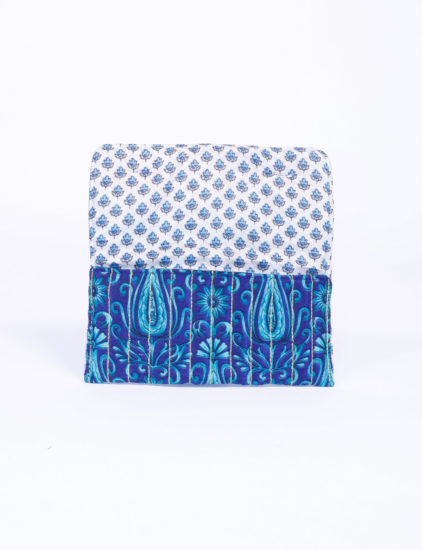 Quilted sunglasses case made from recycled sari products, featuring a secure magnetic closure. A chic example of ethical fashion, conscious clothing, and carbon neutral fashion. Protect your sunglasses while embracing circular fashion and upcycled garments.