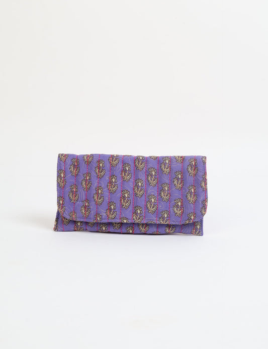 Quilted sunglasses case made from recycled sari products, featuring a secure magnetic closure. A chic example of ethical fashion, conscious clothing, and carbon neutral fashion. Protect your sunglasses while embracing circular fashion and upcycled garments.