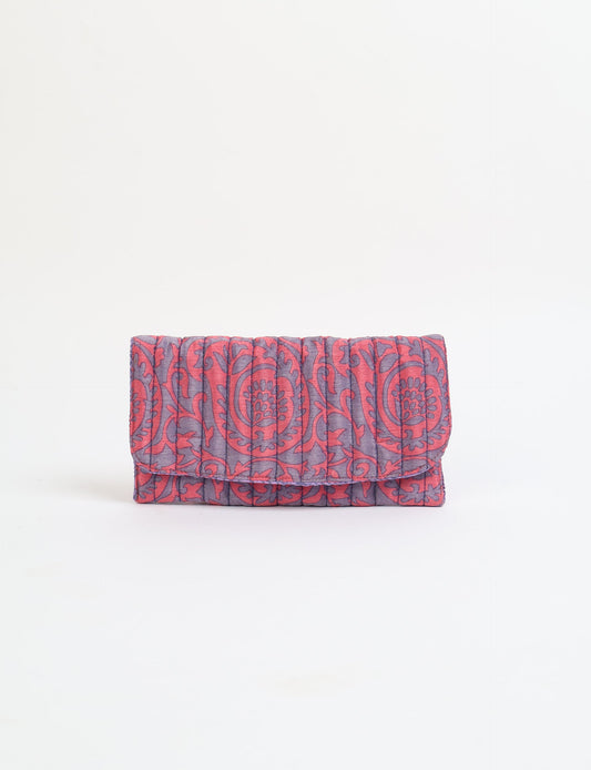 Quilted sunglasses case made from recycled sari products, featuring a secure magnetic closure. A chic example of ethical fashion, conscious clothing, and carbon neutral fashion. Protect your sunglasses while embracing circular fashion and upcycled garments.