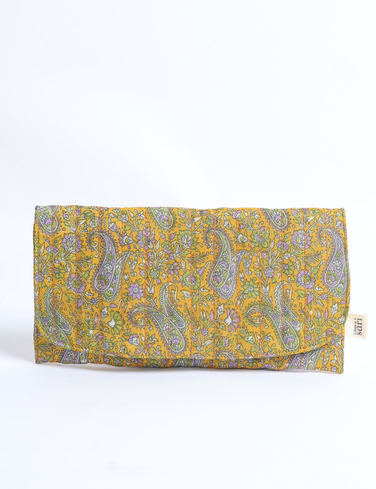 Quilted sunglasses case in yellow fabric with purple and green paisley floral pattern, folded flat with label tag visible