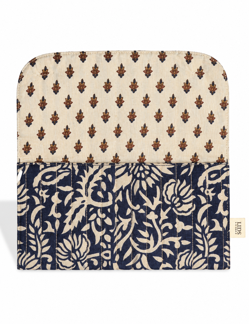 Quilted sunglasses case made from recycled sari products, featuring a secure magnetic closure. A chic example of ethical fashion, conscious clothing, and carbon neutral fashion. Protect your sunglasses while embracing circular fashion and upcycled garments.