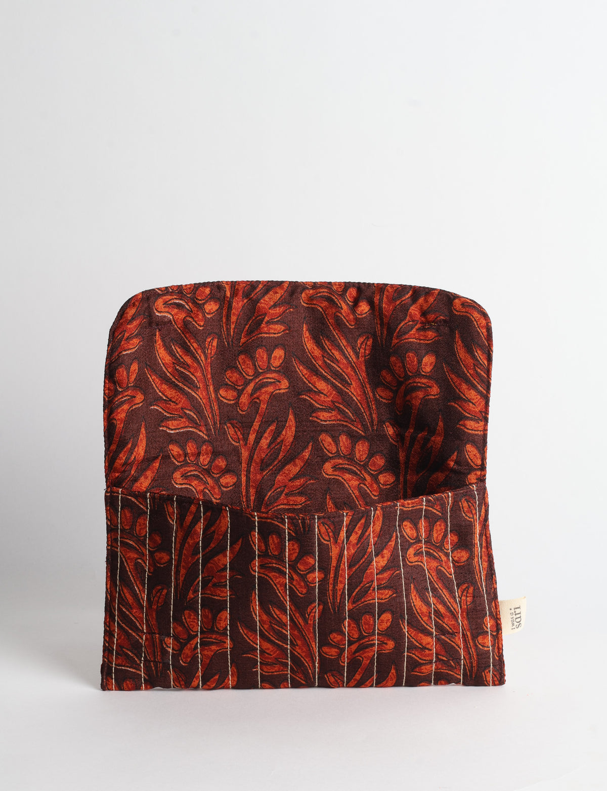 Quilted sunglasses case made from recycled sari products, featuring a secure magnetic closure. A chic example of ethical fashion, conscious clothing, and carbon neutral fashion. Protect your sunglasses while embracing circular fashion and upcycled garments.