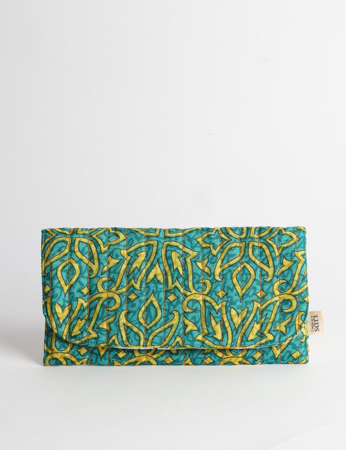 Quilted sunglasses case made from recycled sari products, featuring a secure magnetic closure. A chic example of ethical fashion, conscious clothing, and carbon neutral fashion. Protect your sunglasses while embracing circular fashion and upcycled garments.