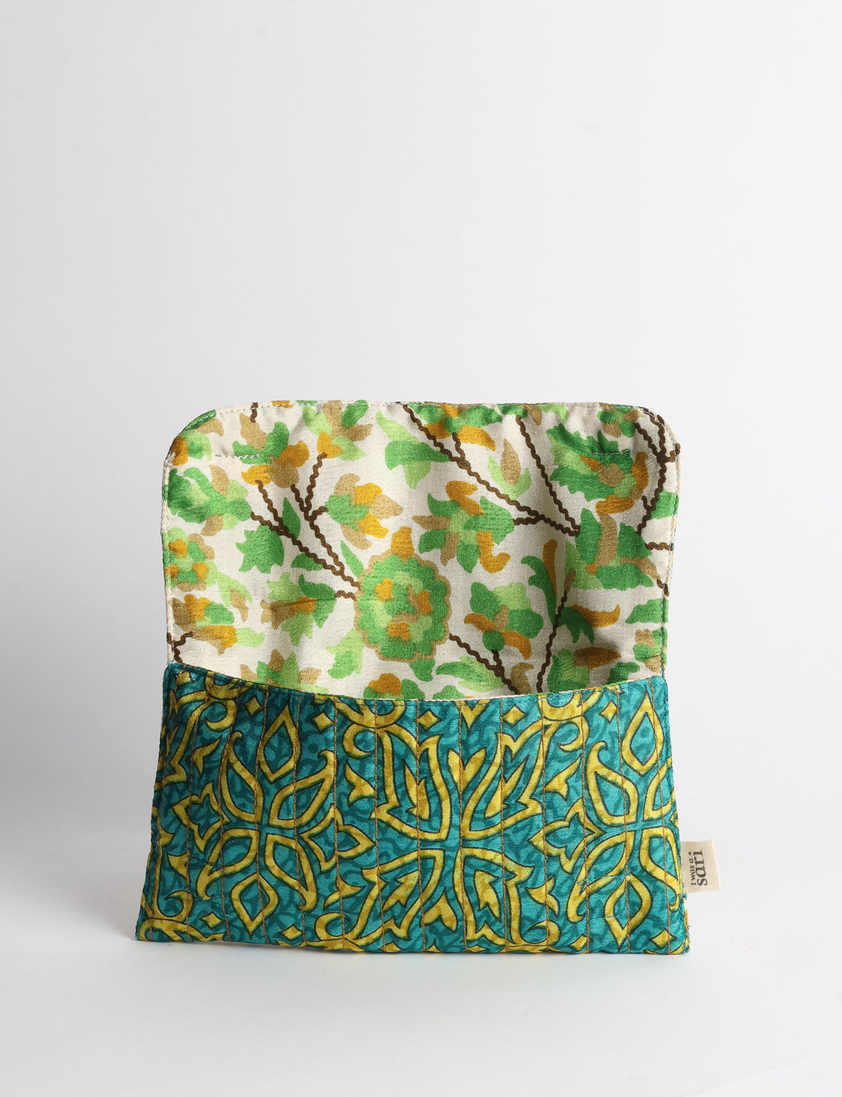 Quilted sunglasses case made from recycled sari products, featuring a secure magnetic closure. A chic example of ethical fashion, conscious clothing, and carbon neutral fashion. Protect your sunglasses while embracing circular fashion and upcycled garments.