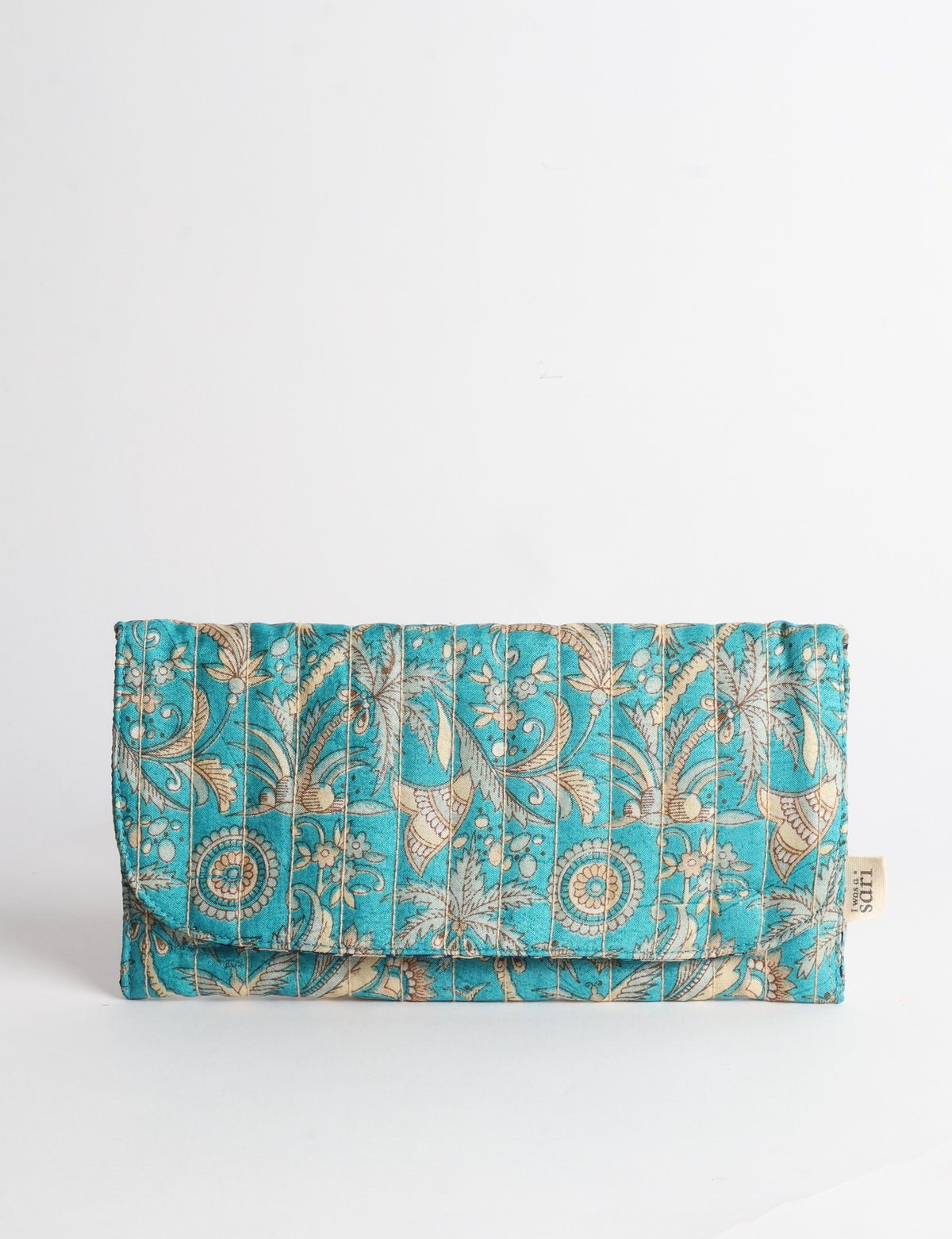 Quilted sunglasses case made from recycled sari products, featuring a secure magnetic closure. A chic example of ethical fashion, conscious clothing, and carbon neutral fashion. Protect your sunglasses while embracing circular fashion and upcycled garments.
