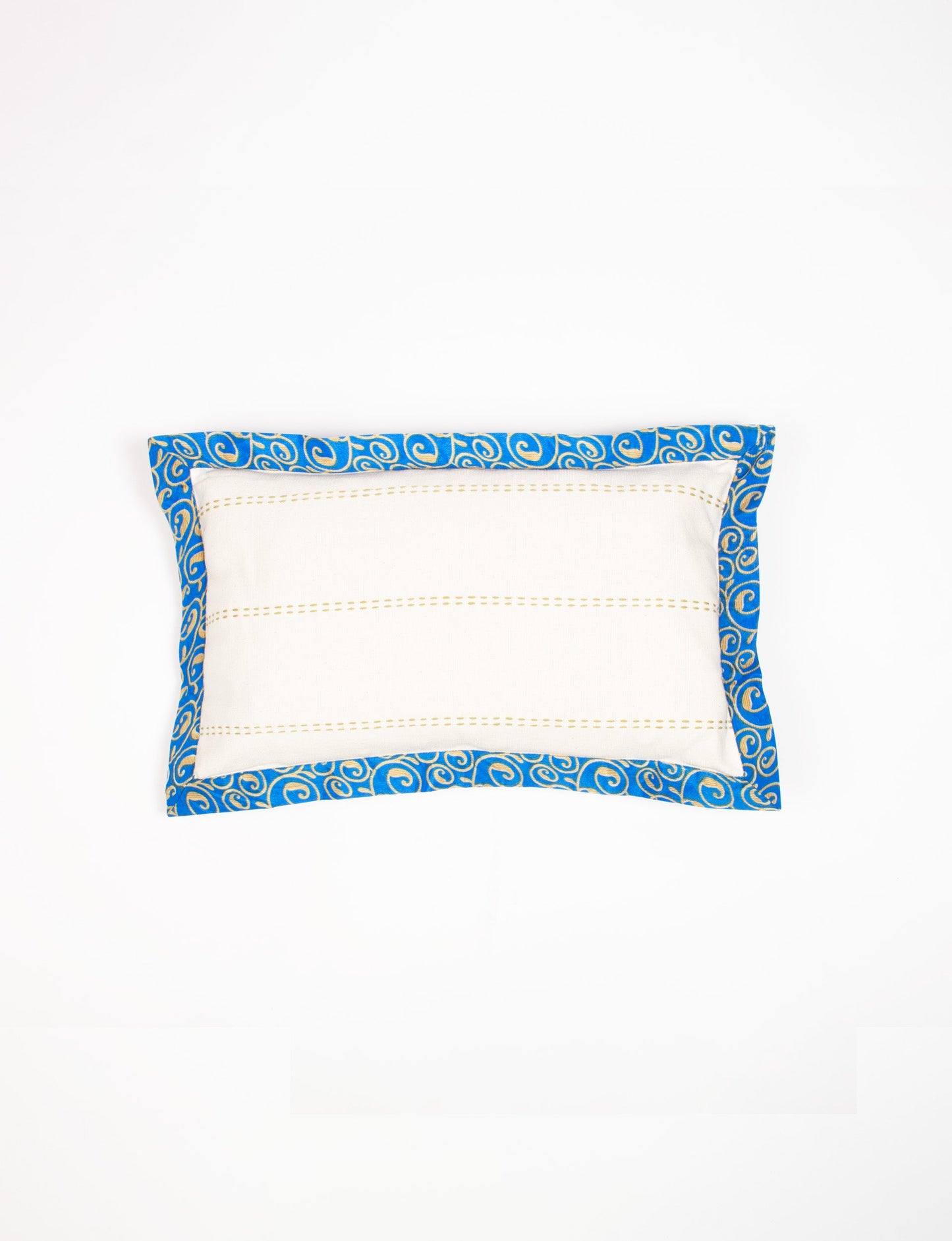 Lumbar cotton cushion cover showcasing intricate threadwork and broad sari edging, made with recycled materials and designed for those who value upcycled clothing, conscious clothing, and circular fashion.