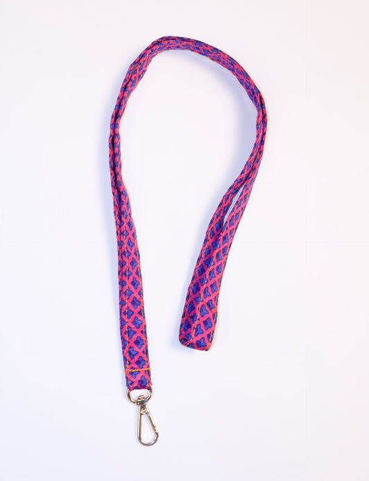 Mobile Phone Lanyard made from recycled sari fabric, featuring repurposed clothing design. Ethical fashion piece promoting eco-friendly fashion, fair trade fashion, and upcycling fashion. Handcrafted by skilled artisans, reflecting recycled material clothing and environmentally friendly clothing trends.