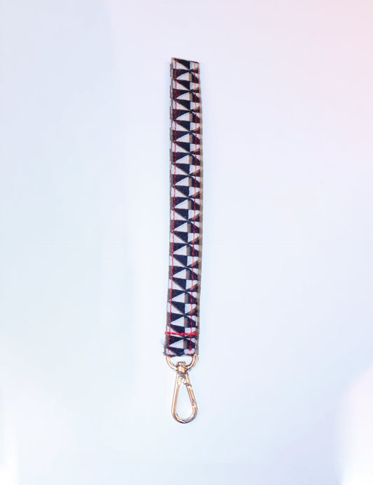 Eco-friendly Keychain Lanyard made from recycled sari products, representing recycled fashion and repurposed clothing. An ethically crafted, sustainable product highlighting upcycling fashion and promoting climate-neutral clothing.