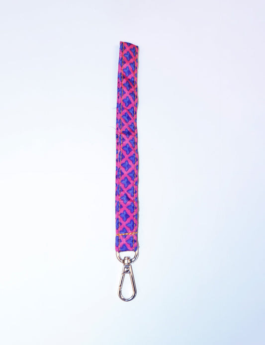 Eco-friendly Keychain Lanyard made from recycled sari products, representing recycled fashion and repurposed clothing. An ethically crafted, sustainable product highlighting upcycling fashion and promoting climate-neutral clothing.