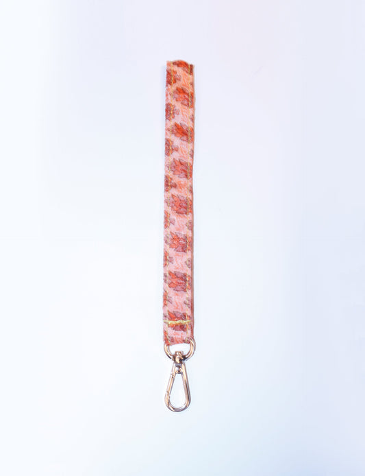 Eco-friendly Keychain Lanyard made from recycled sari products, representing recycled fashion and repurposed clothing. An ethically crafted, sustainable product highlighting upcycling fashion and promoting climate-neutral clothing.