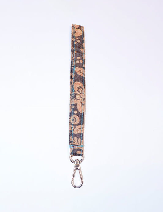 Eco-friendly Keychain Lanyard made from recycled sari products, representing recycled fashion and repurposed clothing. An ethically crafted, sustainable product highlighting upcycling fashion and promoting climate-neutral clothing.