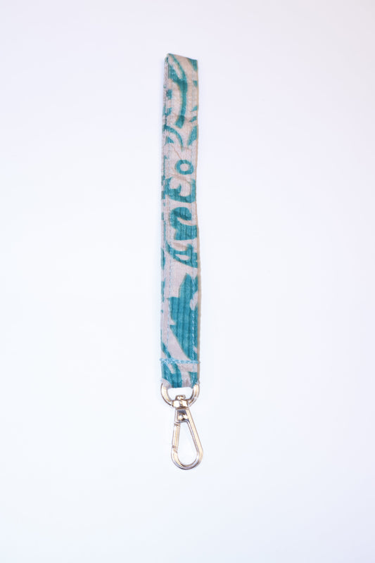 Eco-friendly Keychain Lanyard made from recycled sari products, representing recycled fashion and repurposed clothing. An ethically crafted, sustainable product highlighting upcycling fashion and promoting climate-neutral clothing.