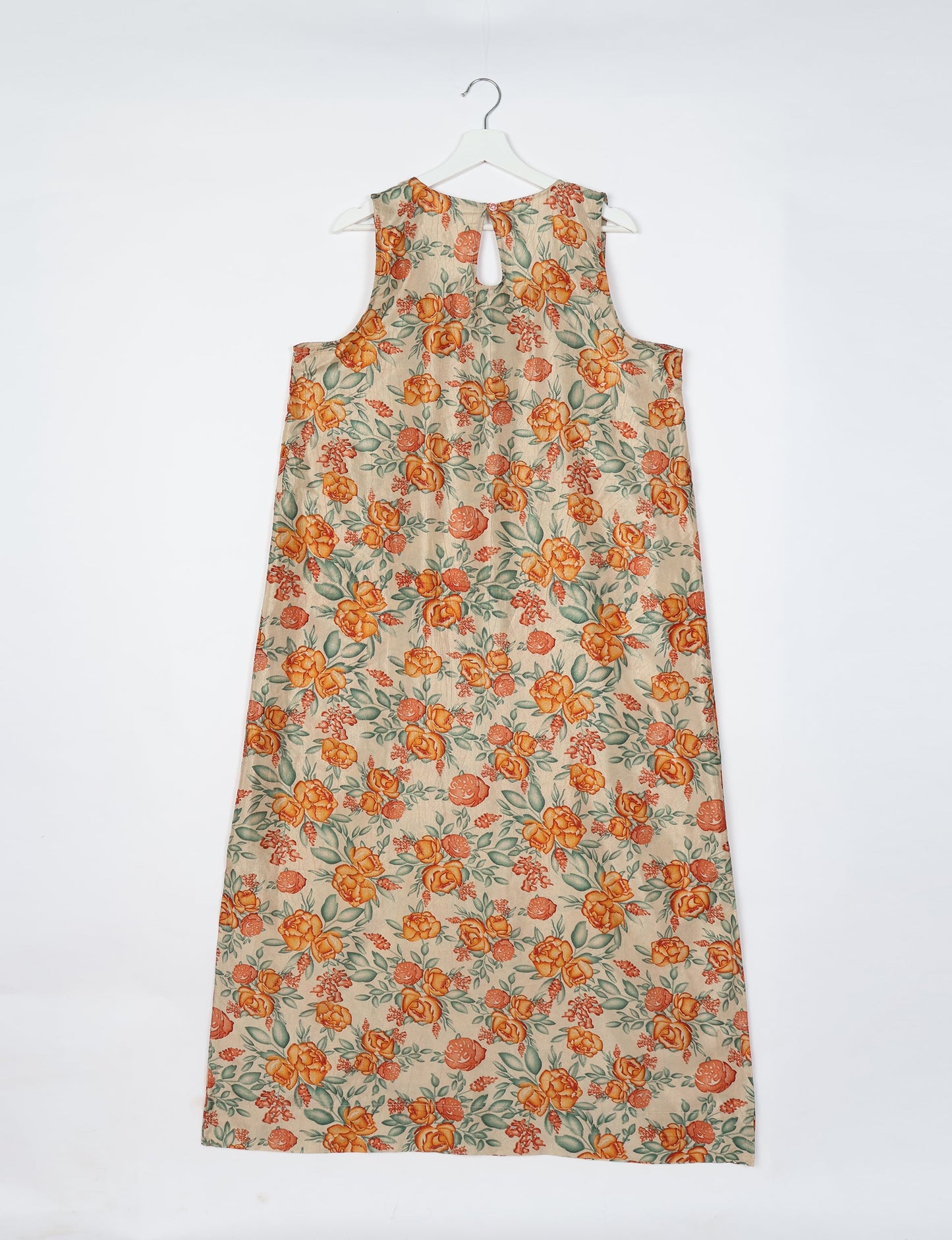 Sleeveless A-Line maxi dress made from recycled saris, showcasing eco clothing and green fashion. A chic example of upcycled women's clothing and climate neutral clothing, perfect for fans of circular fashion, carbon neutral fashion, and products made from textile waste.