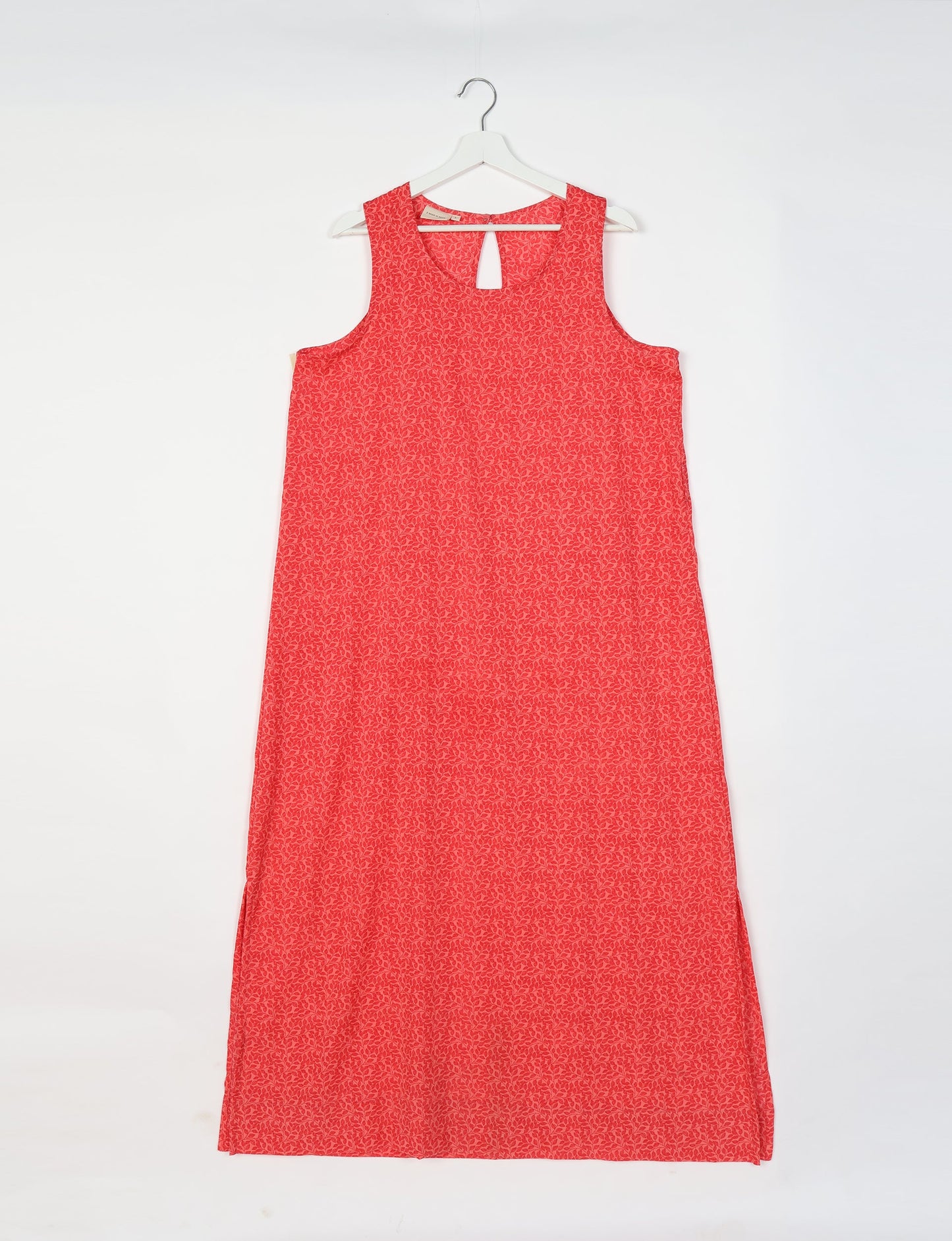 Sleeveless A-Line maxi dress made from recycled saris, showcasing eco clothing and green fashion. A chic example of upcycled women's clothing and climate neutral clothing, perfect for fans of circular fashion, carbon neutral fashion, and products made from textile waste.