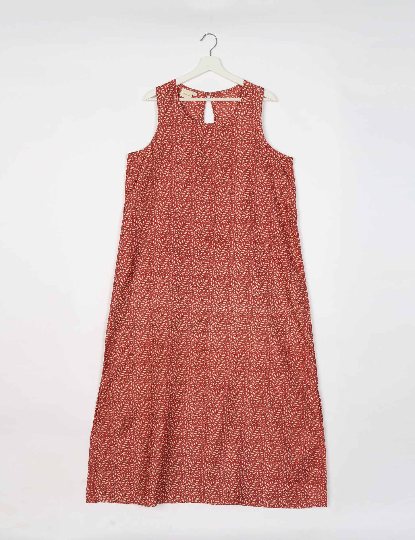 Sleeveless A-Line maxi dress made from recycled saris, showcasing eco clothing and green fashion. A chic example of upcycled women's clothing and climate neutral clothing, perfect for fans of circular fashion, carbon neutral fashion, and products made from textile waste.