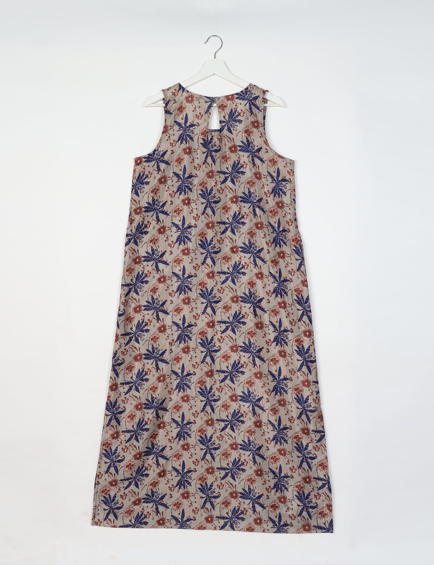 Sleeveless A-Line maxi dress made from recycled saris, showcasing eco clothing and green fashion. A chic example of upcycled women's clothing and climate neutral clothing, perfect for fans of circular fashion, carbon neutral fashion, and products made from textile waste.