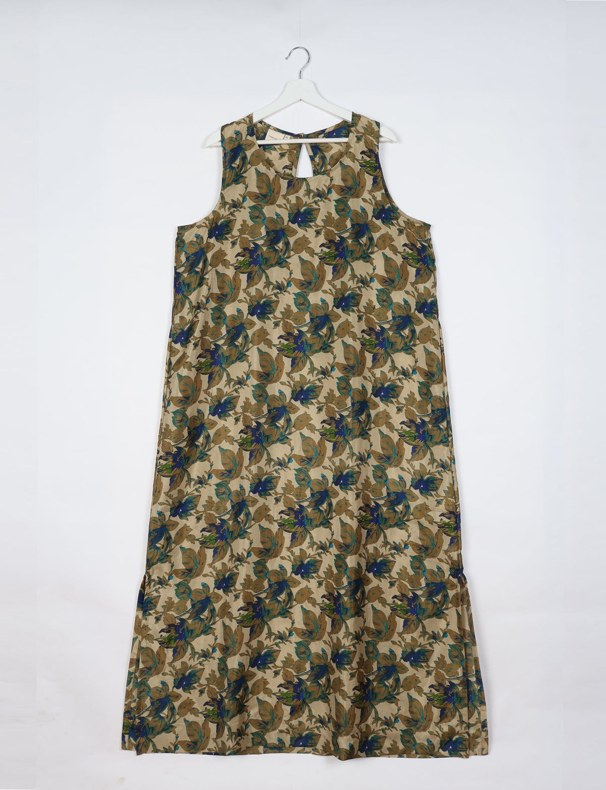 Sleeveless A-Line maxi dress made from recycled saris, showcasing eco clothing and green fashion. A chic example of upcycled women's clothing and climate neutral clothing, perfect for fans of circular fashion, carbon neutral fashion, and products made from textile waste.