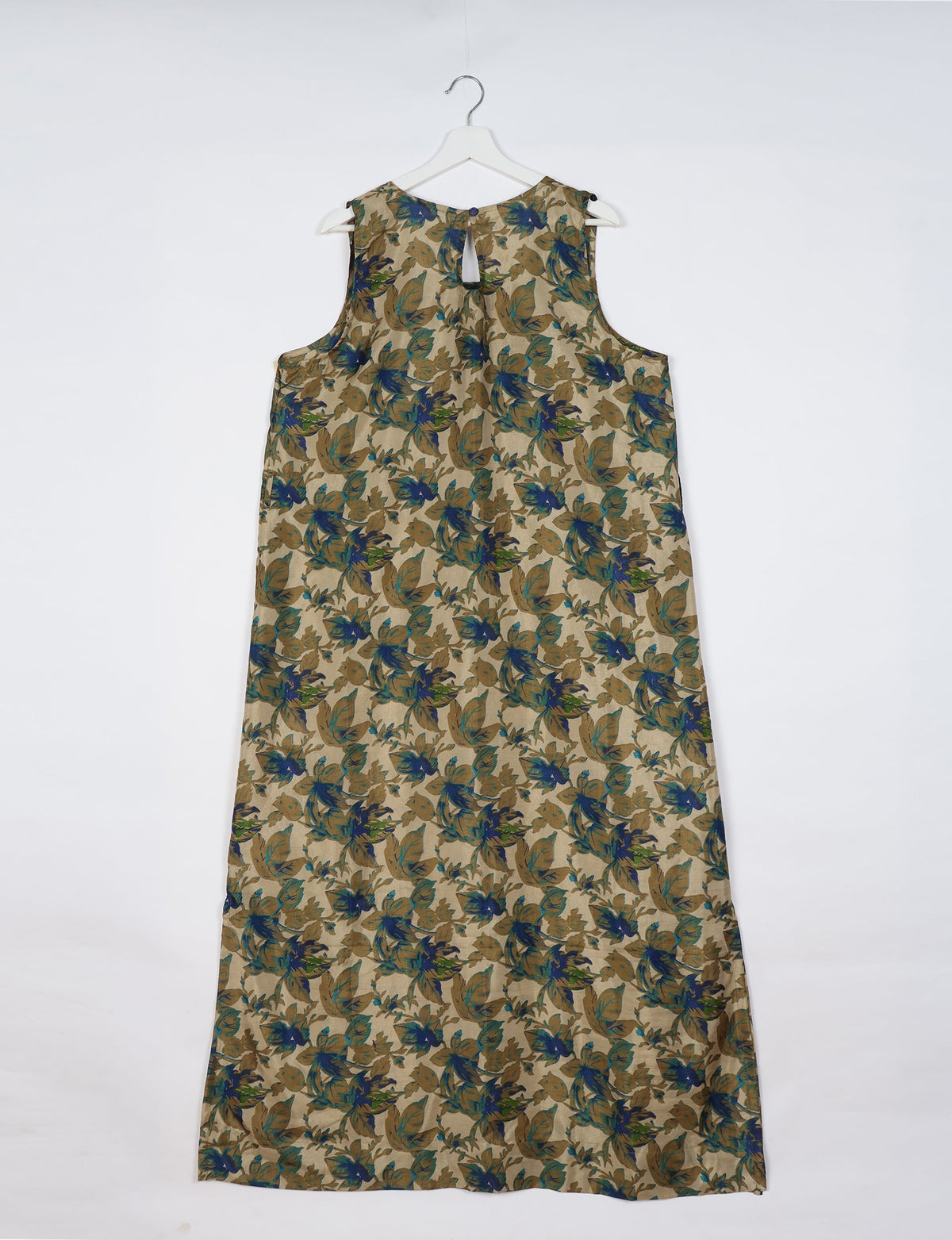 Sleeveless A-Line maxi dress made from recycled saris, showcasing eco clothing and green fashion. A chic example of upcycled women's clothing and climate neutral clothing, perfect for fans of circular fashion, carbon neutral fashion, and products made from textile waste.