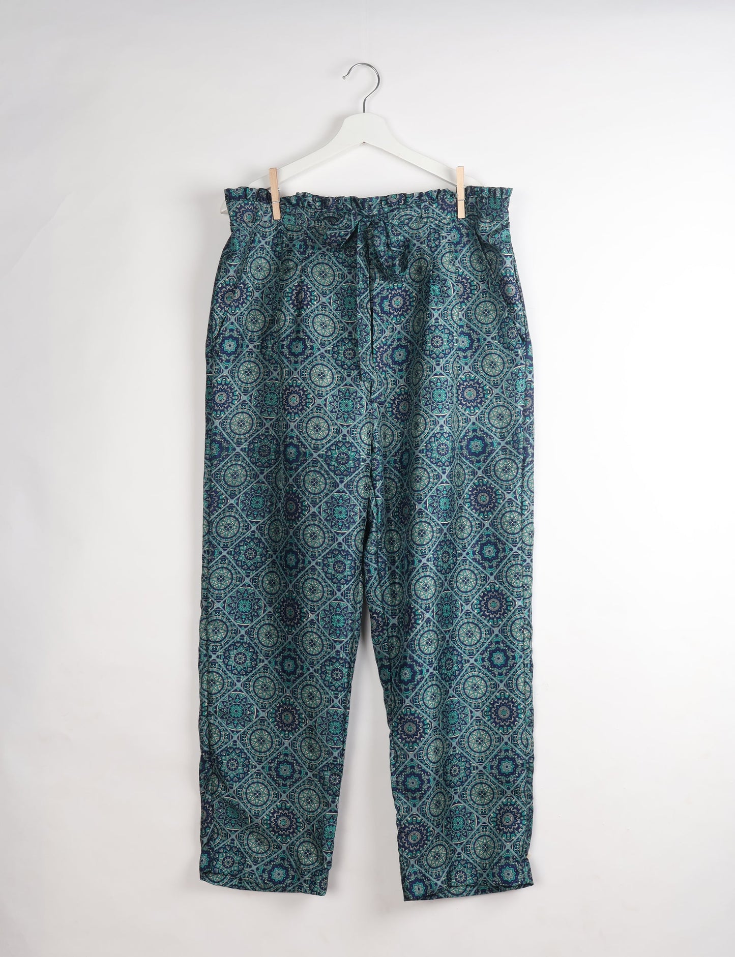 Paperbag high waisted pull-on pants for women made from upcycled garments and recycled fabric, featuring eco clothing design with an elasticated waistband and side pockets. A beautiful example of sustainable women’s clothing and environmentally friendly clothing inspired by upcycling fashion and green fashion movements.