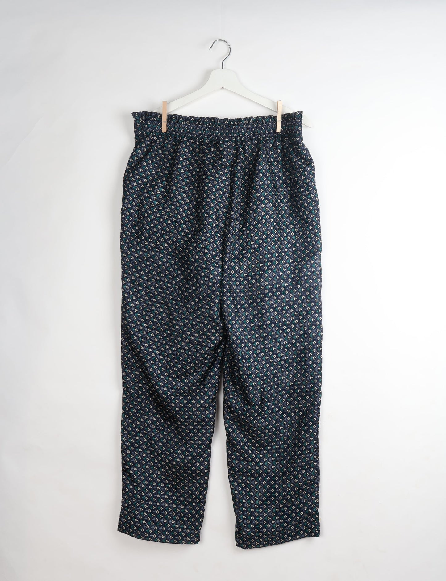 Paperbag high waisted pull-on pants for women made from upcycled garments and recycled fabric, featuring eco clothing design with an elasticated waistband and side pockets. A beautiful example of sustainable women’s clothing and environmentally friendly clothing inspired by upcycling fashion and green fashion movements.