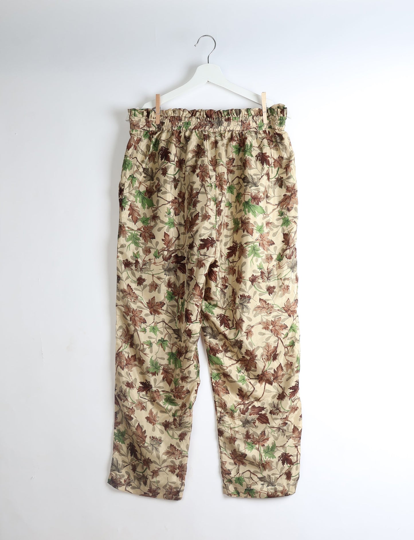 Paperbag high waisted pull-on pants for women made from upcycled garments and recycled fabric, featuring eco clothing design with an elasticated waistband and side pockets. A beautiful example of sustainable women’s clothing and environmentally friendly clothing inspired by upcycling fashion and green fashion movements.