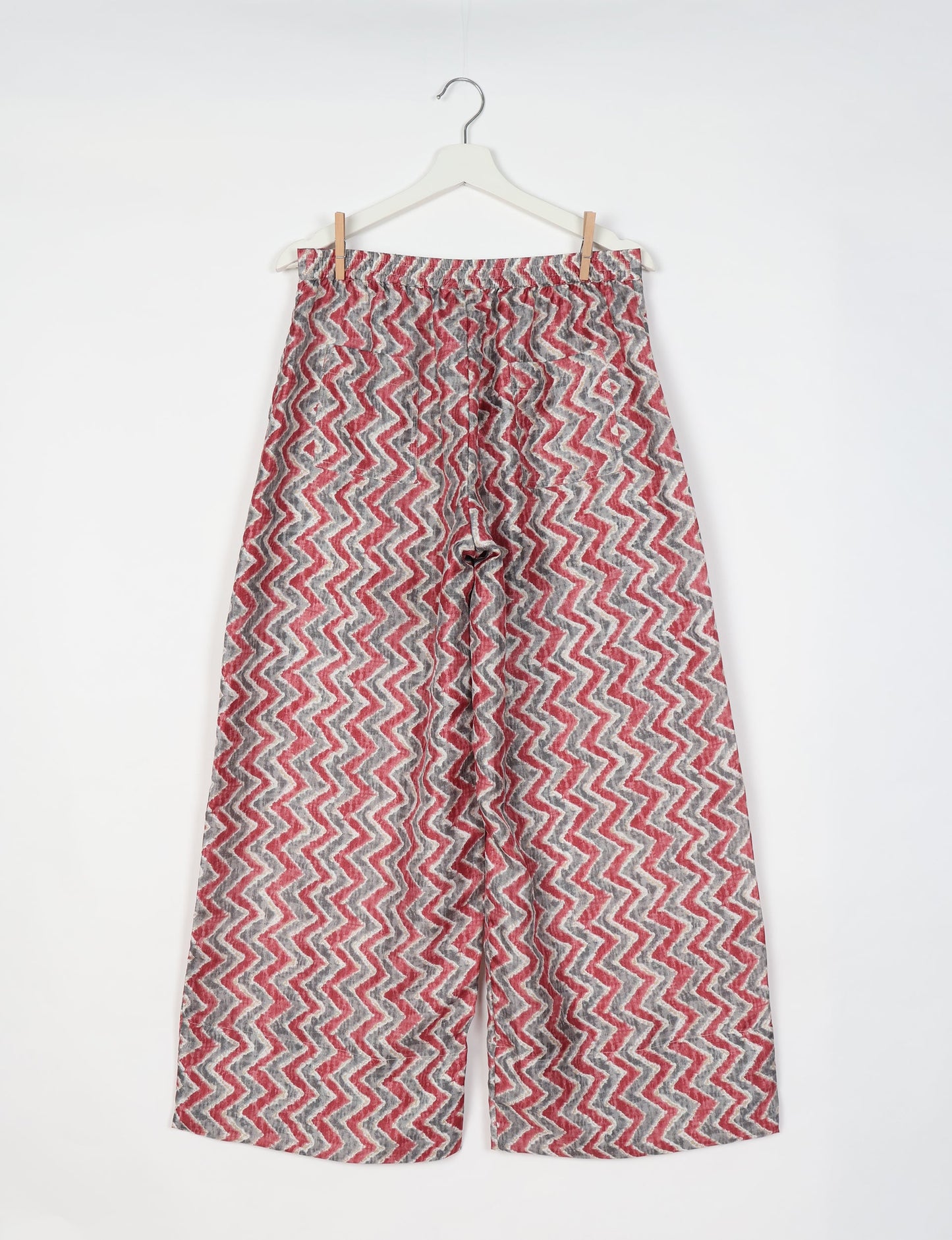 Upcycled women’s wide leg pants made from preloved saris, showcasing eco friendly clothes, zero waste clothing, and carbon neutral fashion.