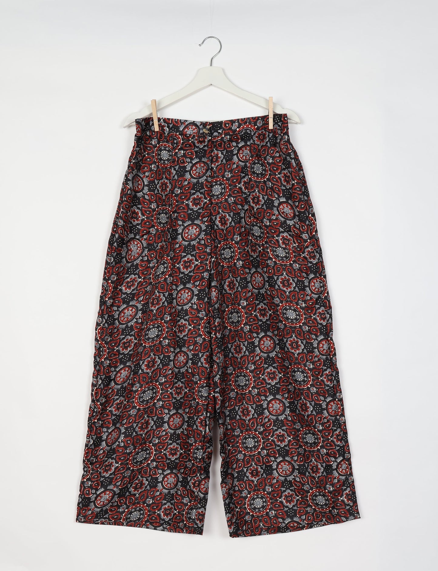 Upcycled women’s wide leg pants made from preloved saris, showcasing eco friendly clothes, zero waste clothing, and carbon neutral fashion.