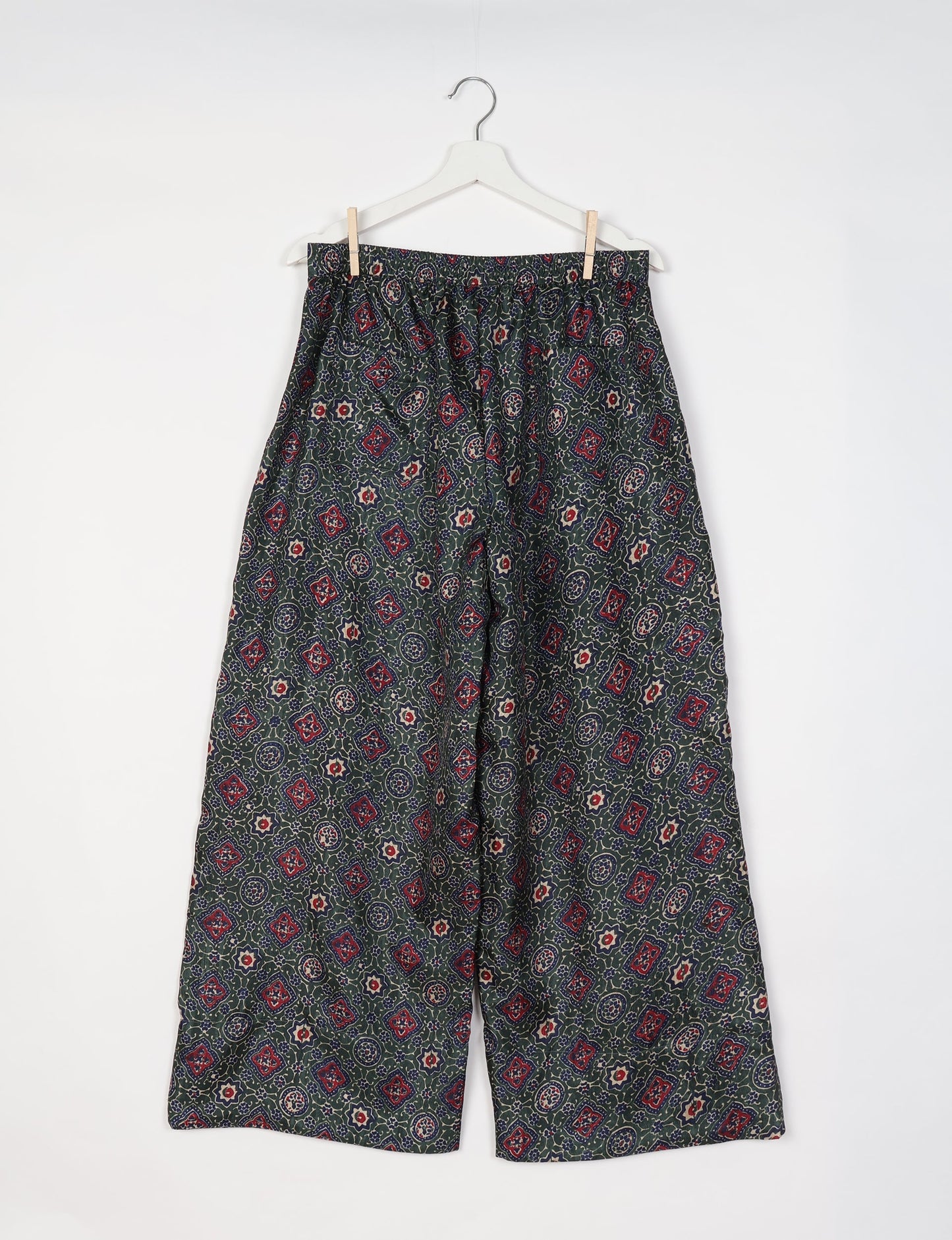 Upcycled women’s wide leg pants made from preloved saris, showcasing eco friendly clothes, zero waste clothing, and carbon neutral fashion.