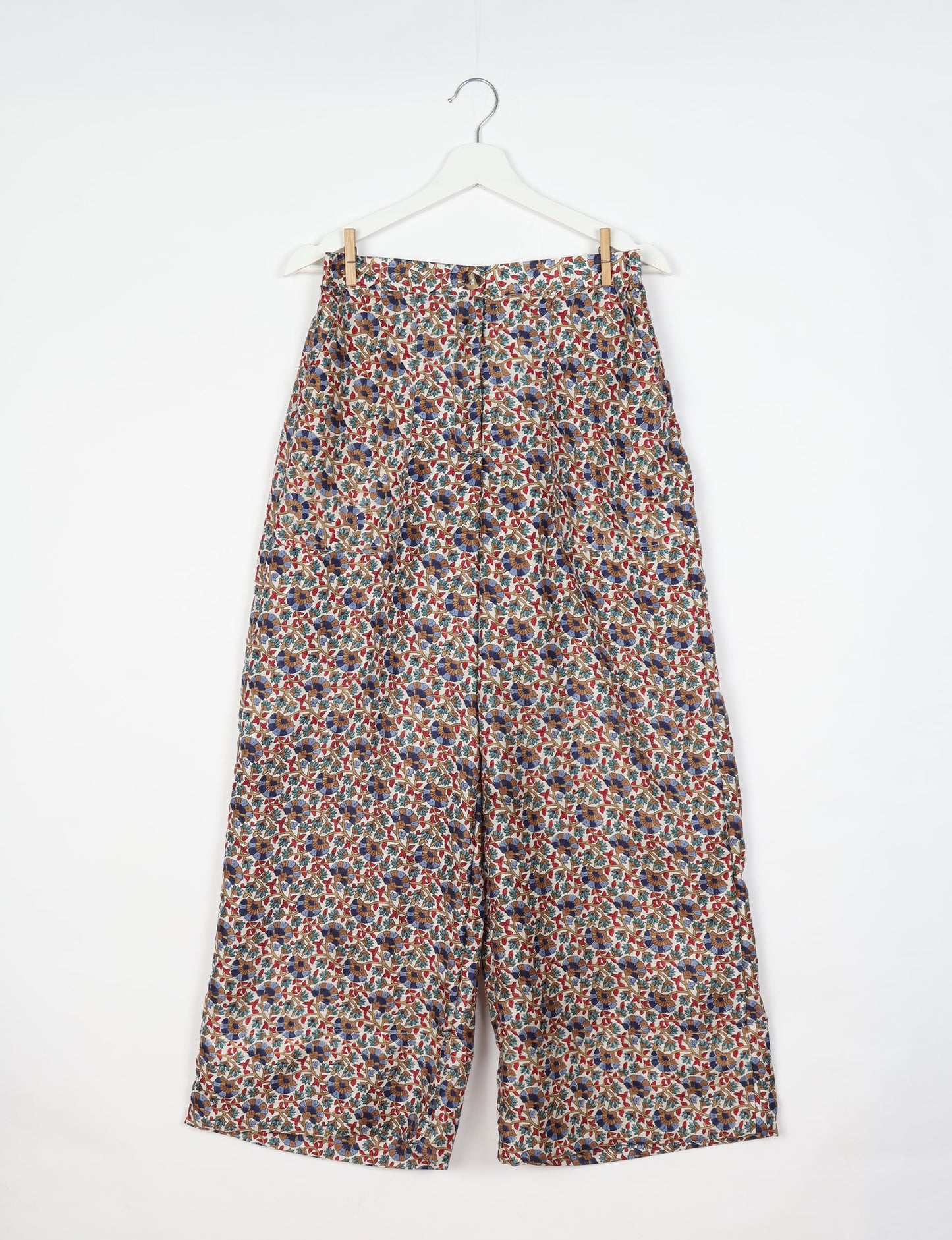 Upcycled women’s wide leg pants made from preloved saris, showcasing eco friendly clothes, zero waste clothing, and carbon neutral fashion.