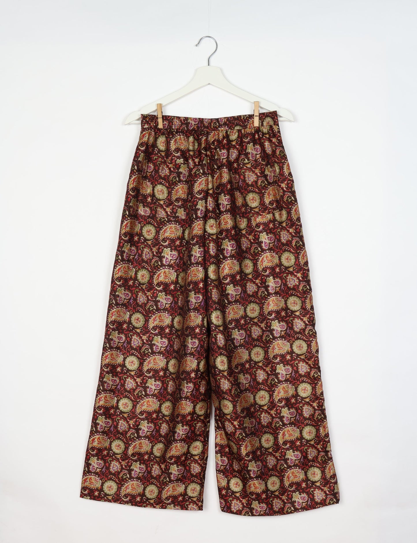 Upcycled women’s wide leg pants made from preloved saris, showcasing eco friendly clothes, zero waste clothing, and carbon neutral fashion.