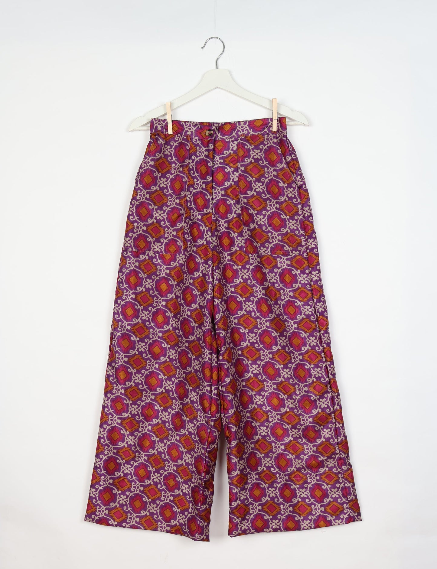 Upcycled women’s wide leg pants made from preloved saris, showcasing eco friendly clothes, zero waste clothing, and carbon neutral fashion.