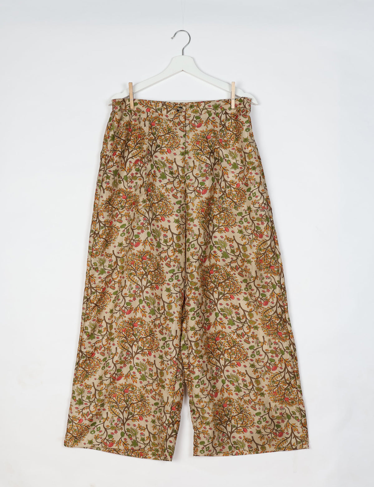 Upcycled women’s wide leg pants made from preloved saris, showcasing eco friendly clothes, zero waste clothing, and carbon neutral fashion.