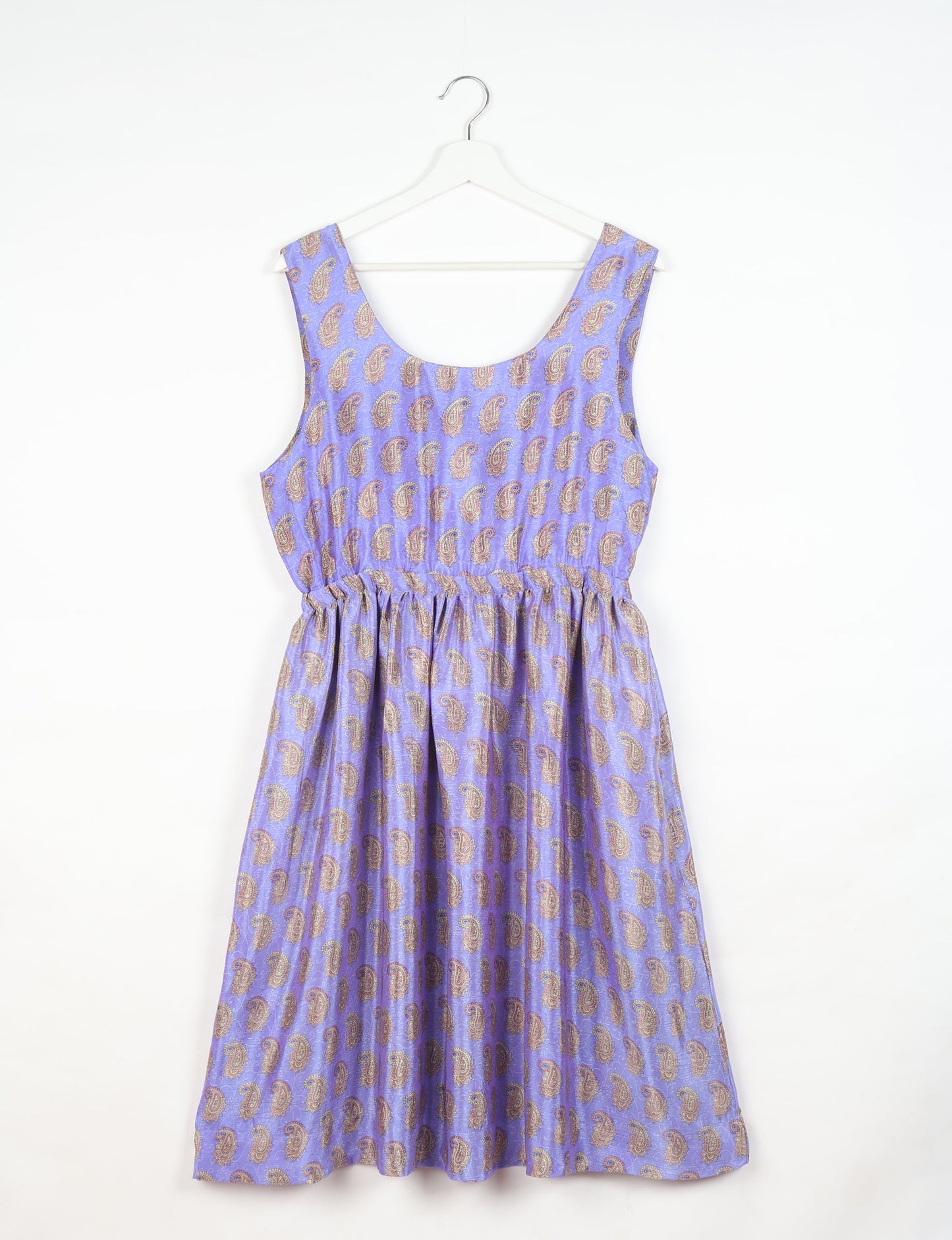 Upcycled women’s fit and flare dress made from recycled sari products, showcasing environment friendly clothing and green fashion design — an eco clothing choice for conscious clothing lovers and sustainable women’s fashion enthusiasts.