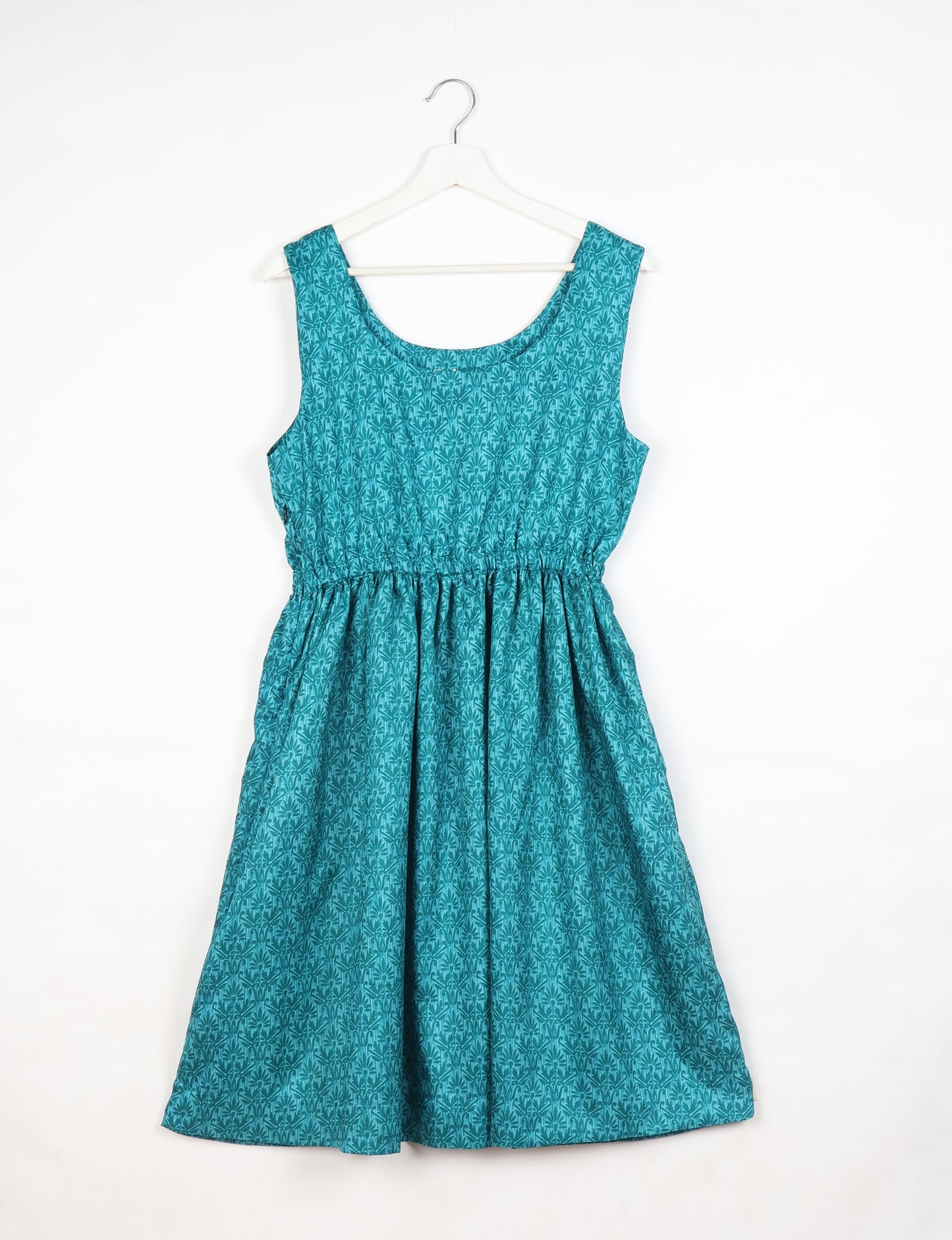 Upcycled women’s fit and flare dress made from recycled sari products, showcasing environment friendly clothing and green fashion design — an eco clothing choice for conscious clothing lovers and sustainable women’s fashion enthusiasts.