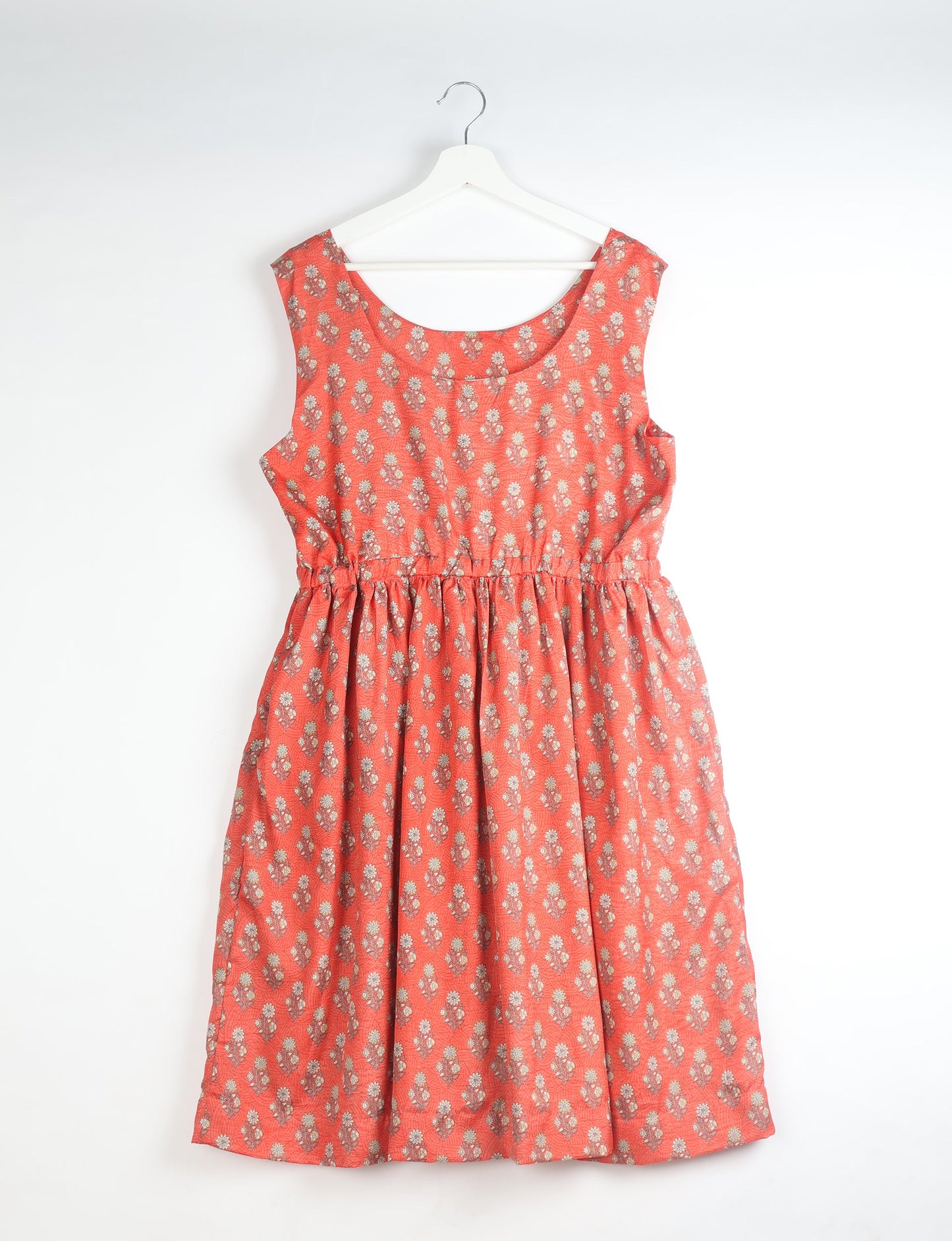 Upcycled women’s fit and flare dress made from recycled sari products, showcasing environment friendly clothing and green fashion design — an eco clothing choice for conscious clothing lovers and sustainable women’s fashion enthusiasts.