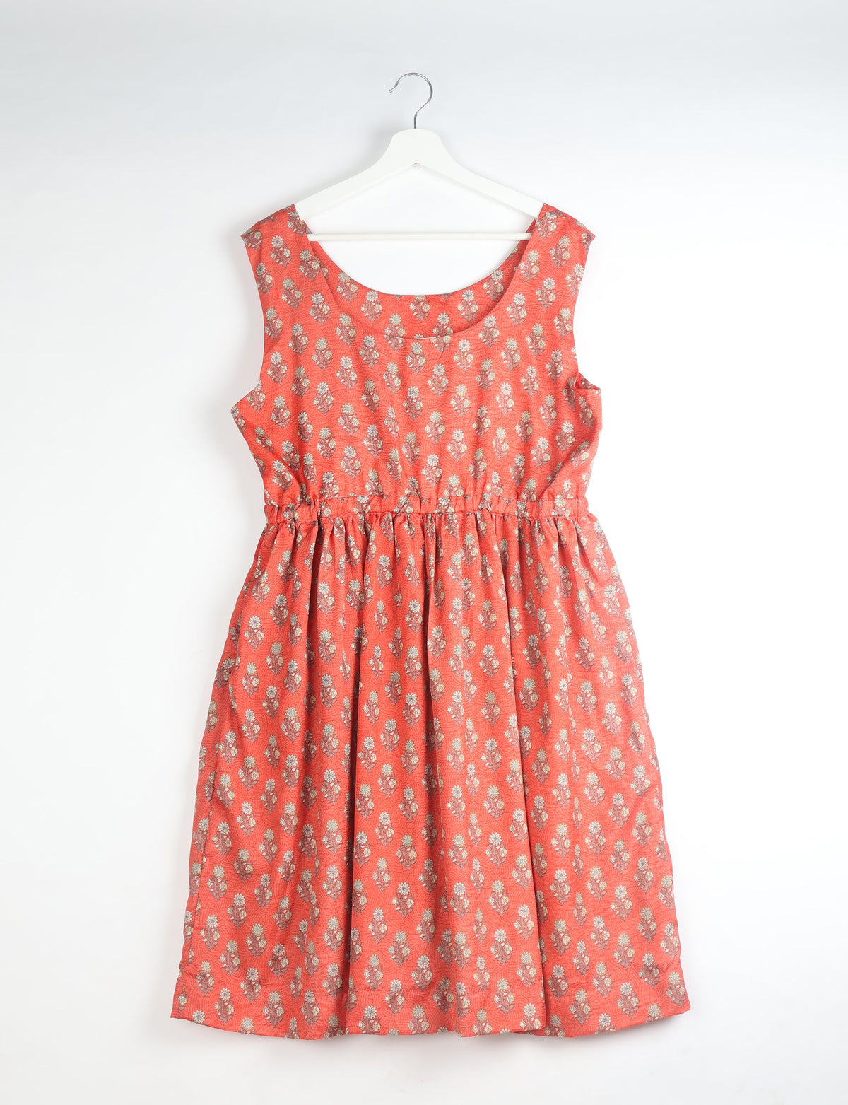 Upcycled women’s fit and flare dress made from recycled sari products, showcasing environment friendly clothing and green fashion design — an eco clothing choice for conscious clothing lovers and sustainable women’s fashion enthusiasts.