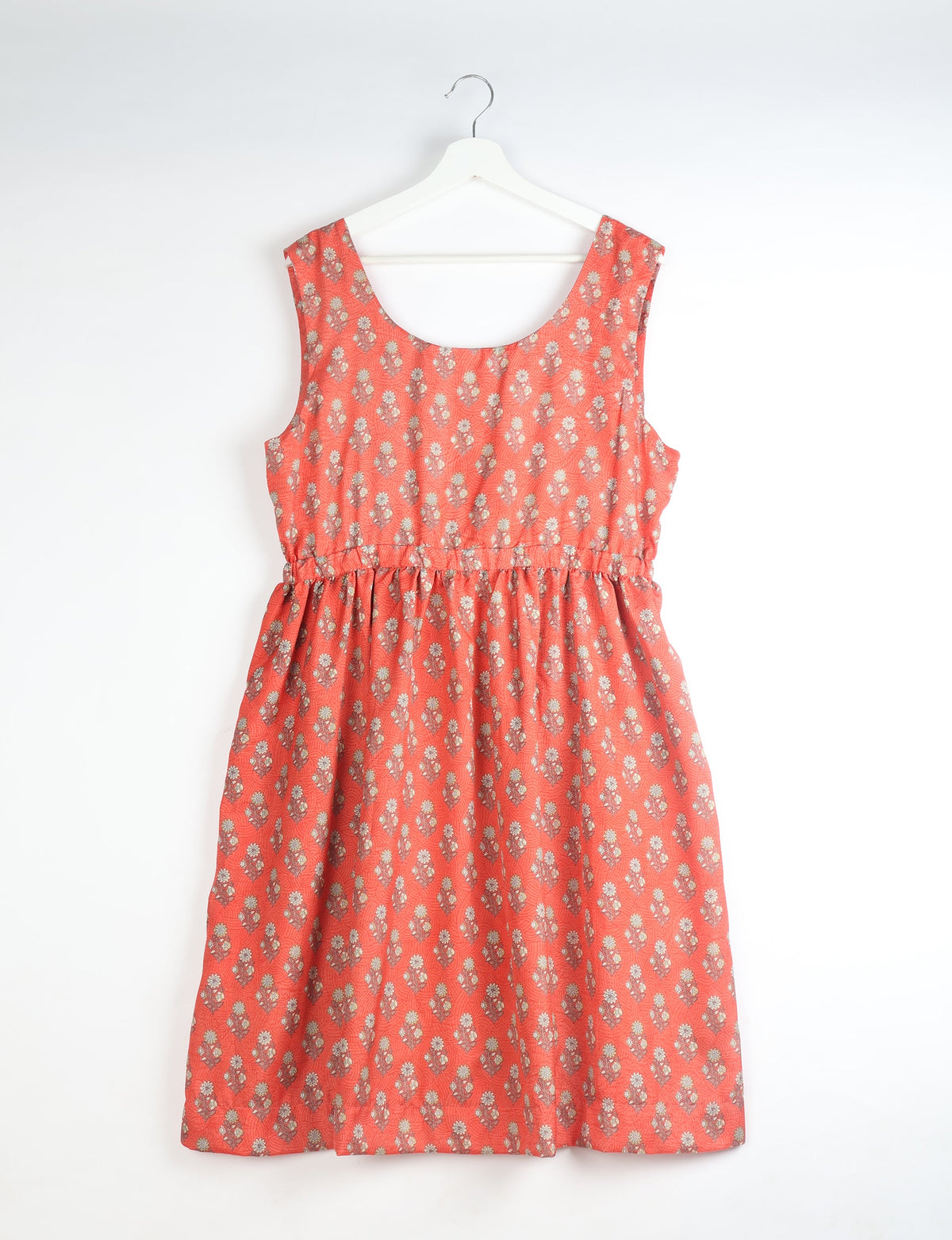 Upcycled women’s fit and flare dress made from recycled sari products, showcasing environment friendly clothing and green fashion design — an eco clothing choice for conscious clothing lovers and sustainable women’s fashion enthusiasts.