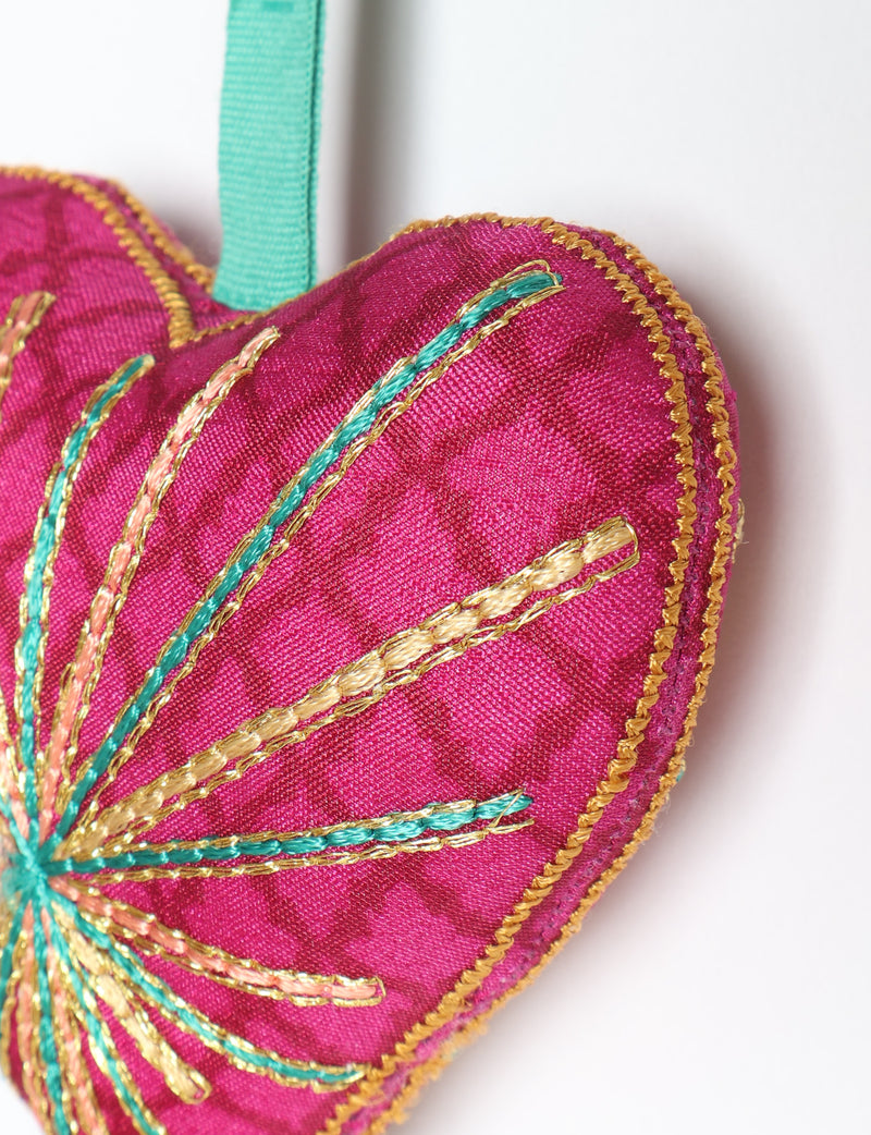 Timeless Heart ornament made from upcycled clothing and recycled fabric, filled with organic cotton and hand-finished with vibrant silk and metallic thread. An eco-friendly, carbon neutral fashion piece that supports green fashion and fair trade apparel.